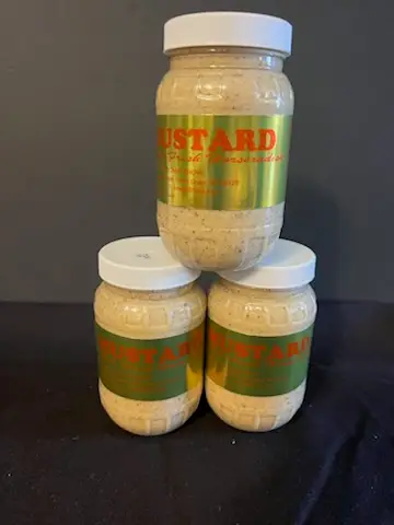 Tubs of mustard sold at Drier's Meat Market to accompany their smoked meats and sausages