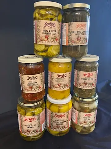 Jars of pickles and relish on the shelf at Drier's Meat Market in Three Oaks, Michigan